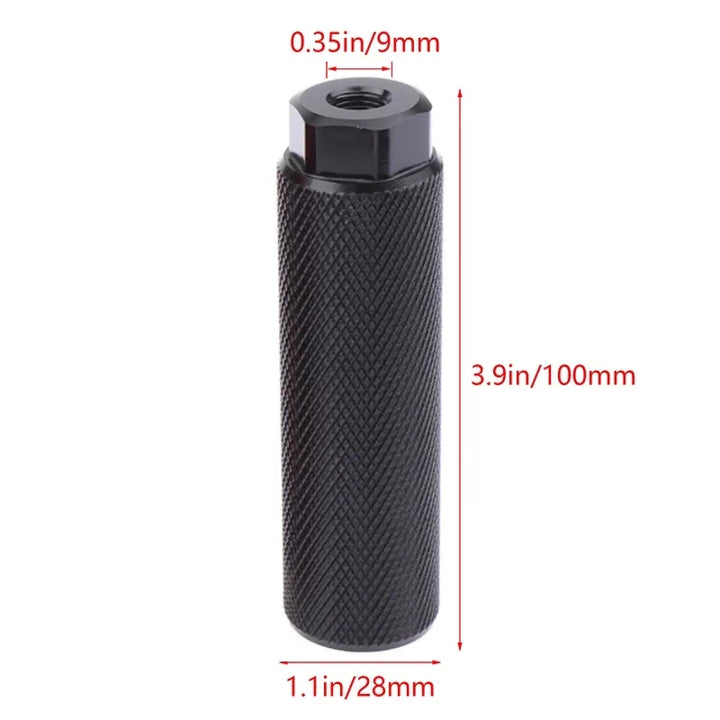 Black alloy foot peg with measurement dimensions shown (100mm length, 28mm diameter, 9mm thread).