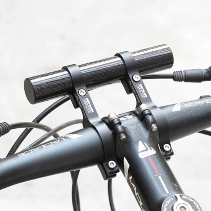 GUB carbon-fibre handlebar extender mounted on bicycle handlebars, providing extra space.