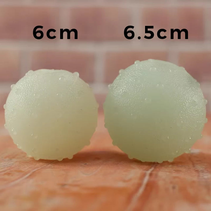 Side-by-side comparison of the Rubber Luminous Elastic Ball in 6cm and 6.5cm sizes, labeled for easy selection, ideal for small and large dogs.