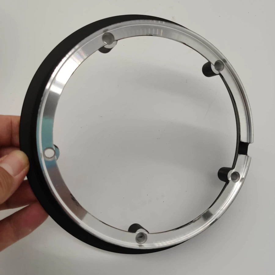 Angled rear view of 5-hole Speedway rim highlighting silver finish and screw mounts.