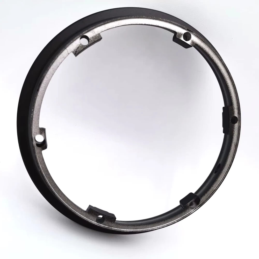 Rear inner surface of detachable hub ring with reinforced bolt holes.
