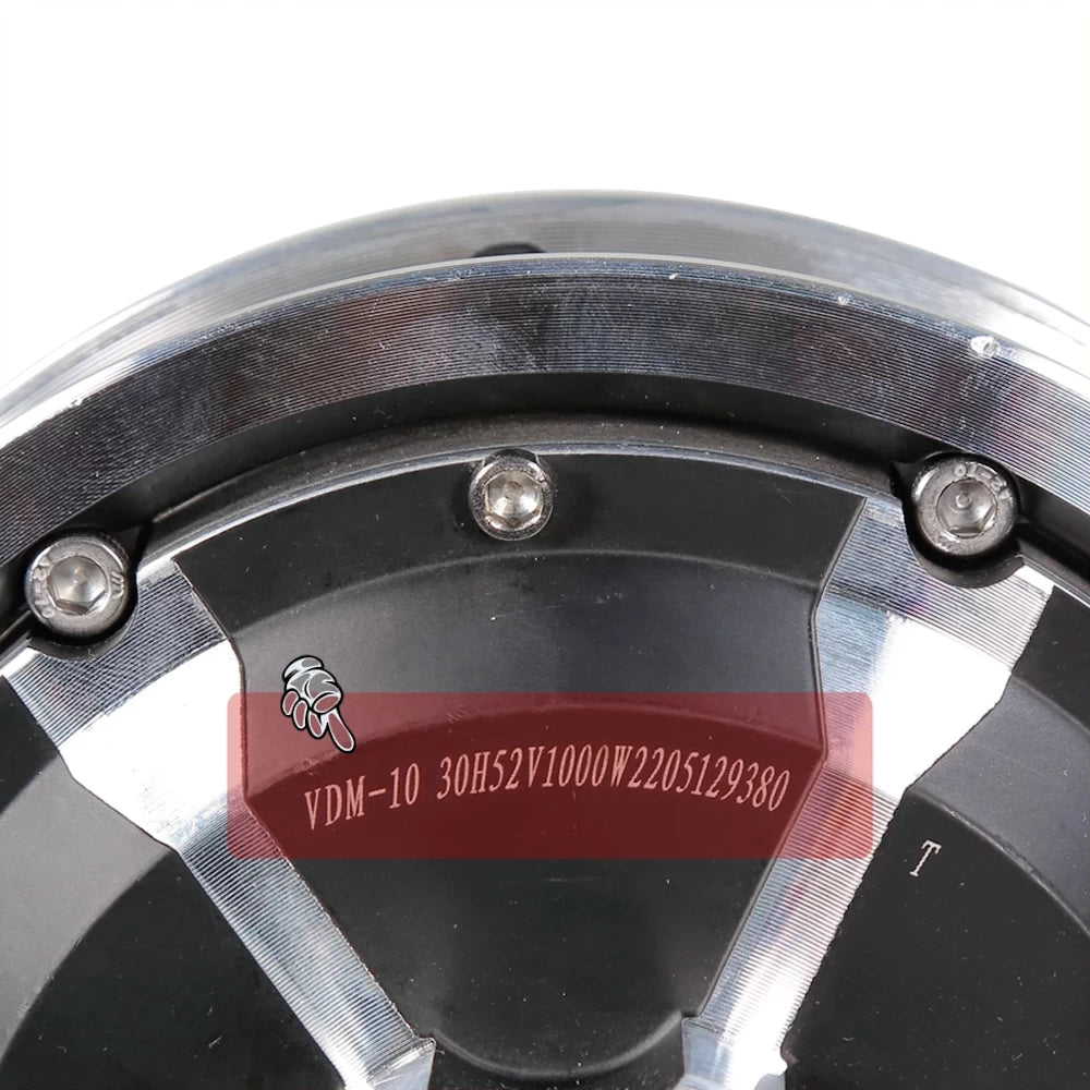 Close-up of VDM-10 motor serial engraving and screws.