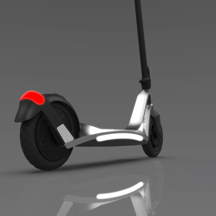 The ION scooter with illuminated side LED lights, improving visibility during night rides.