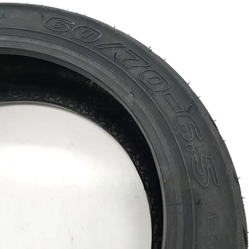 Detailed view of the embossed 60/70-6.5 size markings on the INNOVA tyre for accurate identification and compatibility assurance.