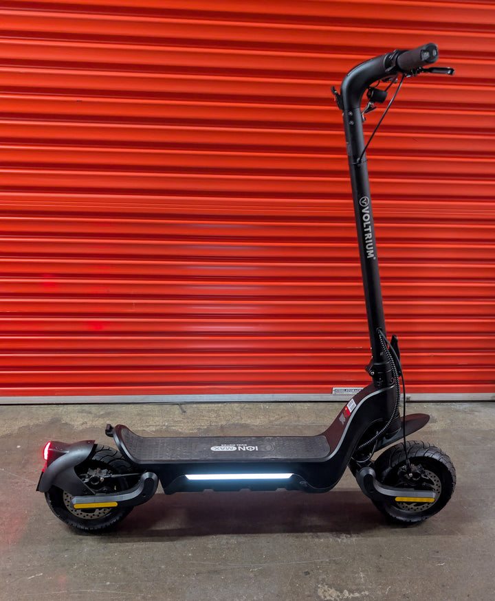 Side on view of Ex Demo Voltrium ION Max Dual Motor, with Side Lights activated