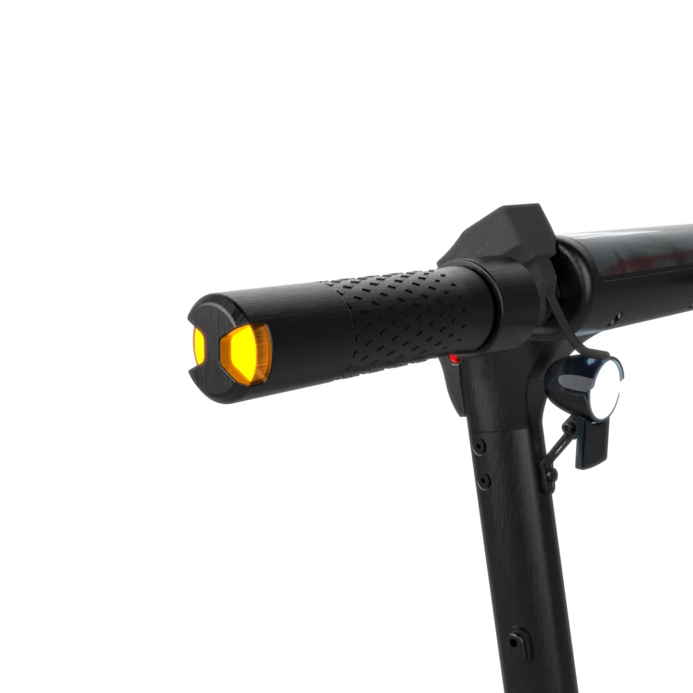 Close-up of the handlebar-mounted turn signals on the Voltrium ION Max, ensuring safer urban riding with clear signaling.