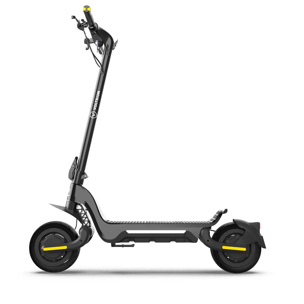 Side profile of the Voltrium ION Max Dual Motor Electric Scooter, emphasizing sleek design and magnesium unibody frame.