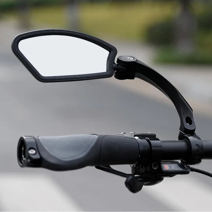 Left-mounted handlebar mirror for electric scooter.