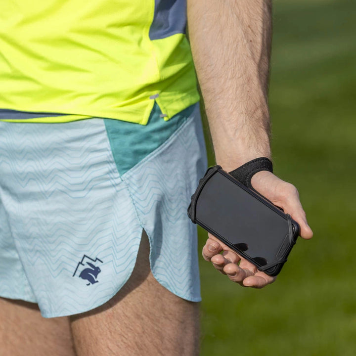 A runner demonstrating the secure fit of NoxGear Phone Holder