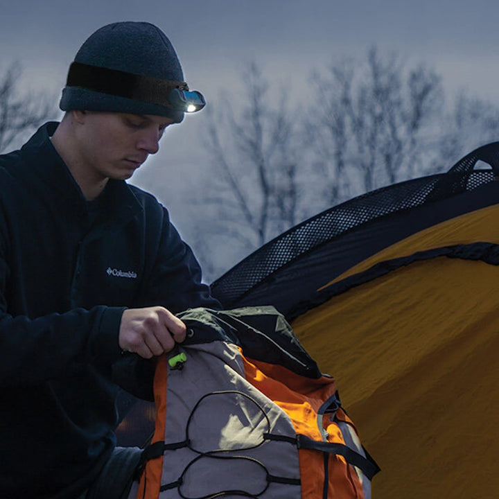 Noxgear 500 lumen rechargeable head light being used for camping at night