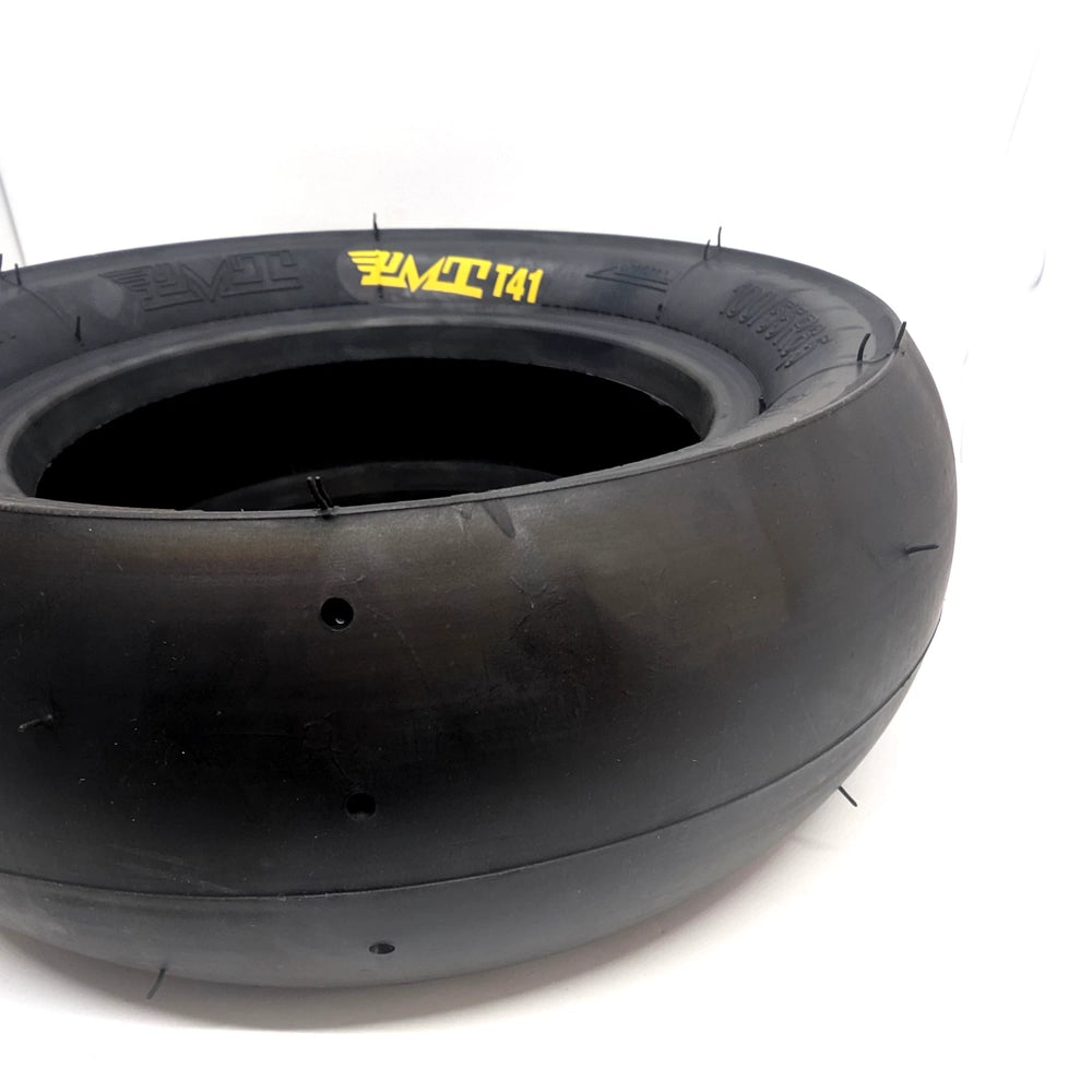 Closeup view of the PMT T41 Slick tread, with the yellow PMT T41 on the tyre wall