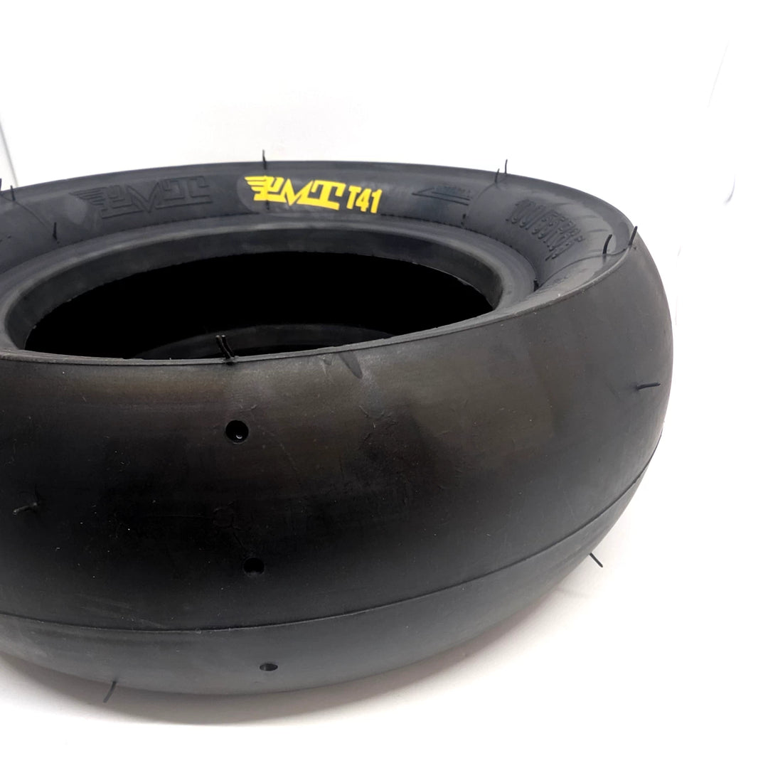 Closeup view of the PMT T41 Slick tread, with the yellow PMT T41 on the tyre wall