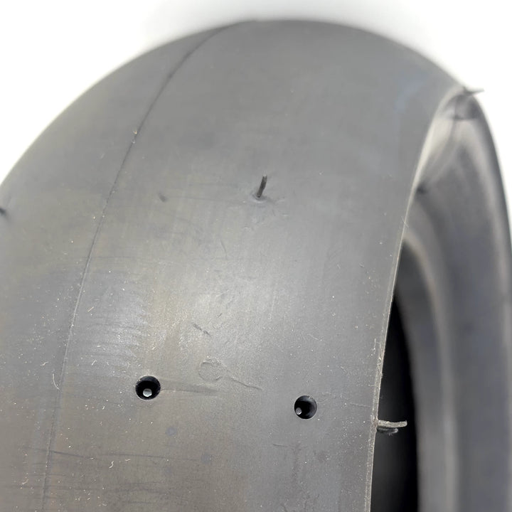 Close-up view of the PMT T41 Slick tread