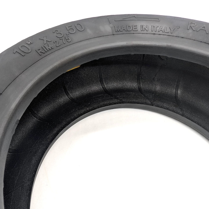 Inside view of the PMT 10x3.50 (85/250 R6.0) E-Fire, showing the radial construction, rim size of 2.75, directional fitment arrow and Made In Italy embossed on tyre wall