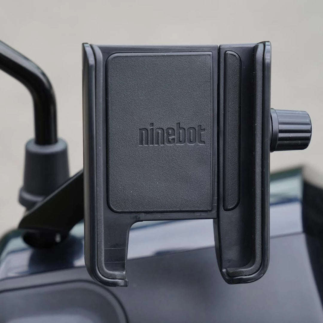 Ninebot P65 electric scooter with OEM phone holder installed on handlebar