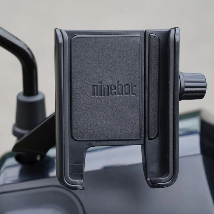 Ninebot P65 electric scooter with OEM phone holder installed on handlebar