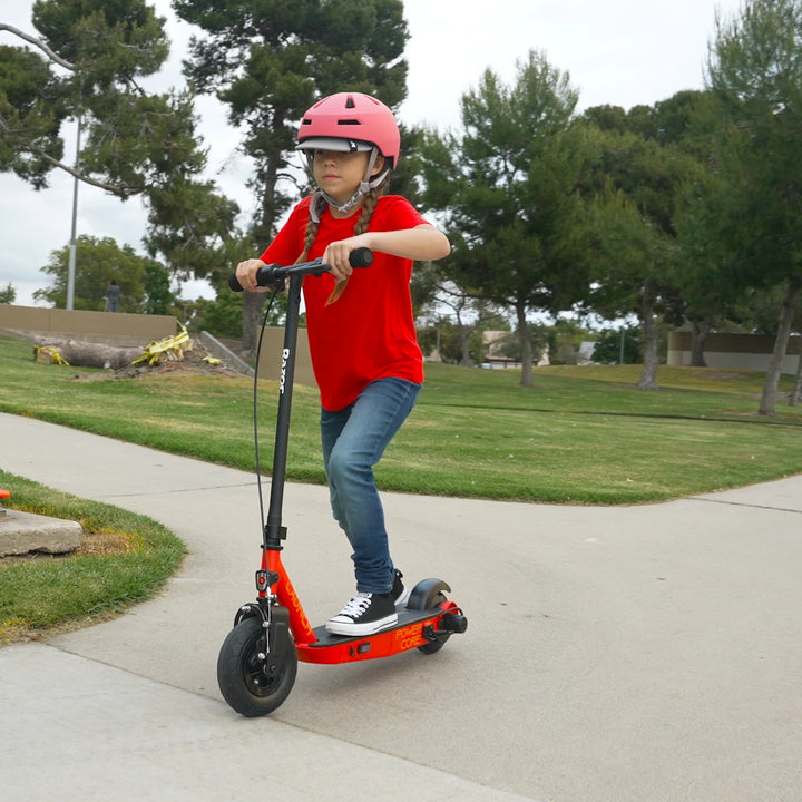 Child riding the Razor PowerCore Launch electric scooter, with a comfortable and stable front-view perspective in a park setting.