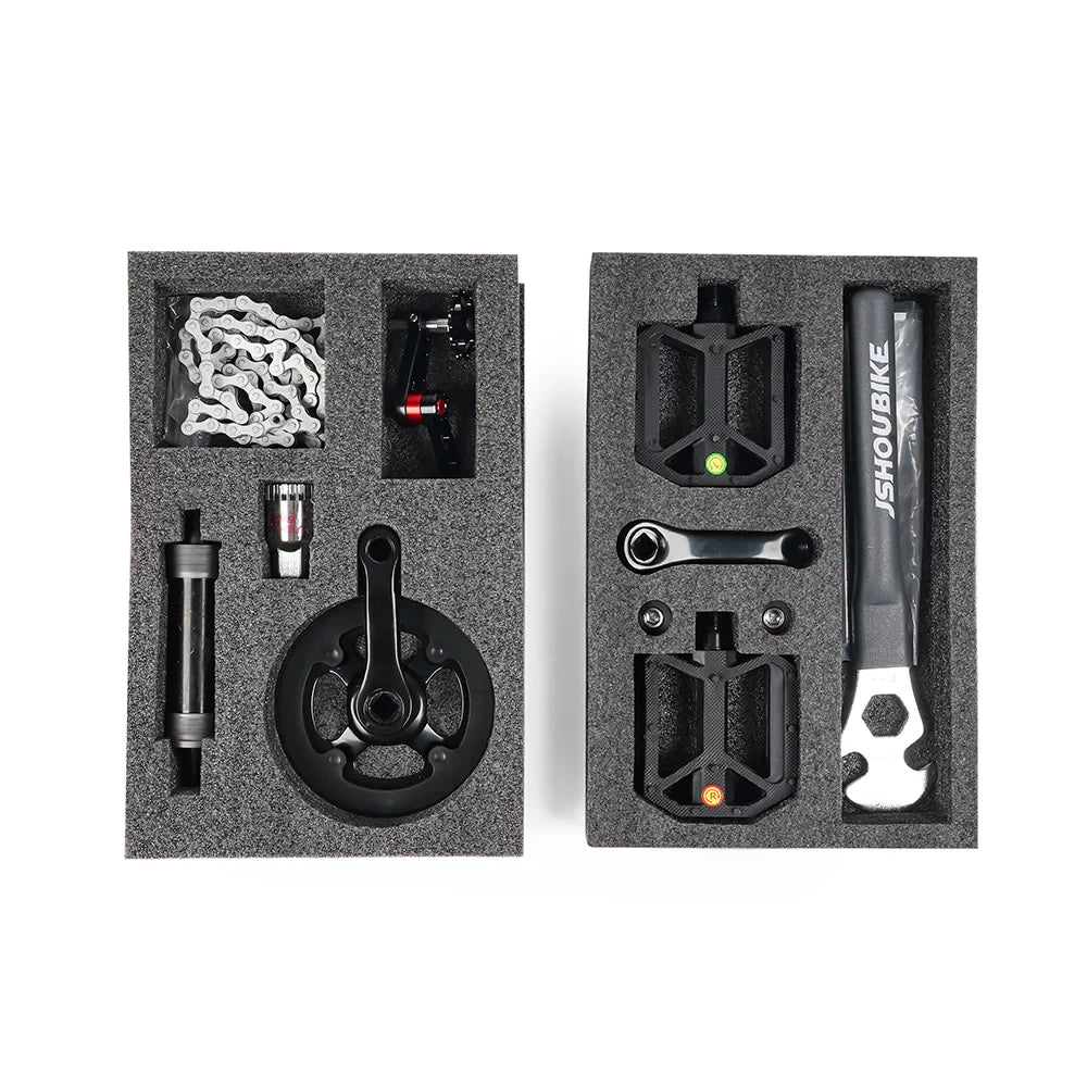 Detailed image showing contents of the Pedal Kit for EMOVE Roadrunner V3, including installation tools.