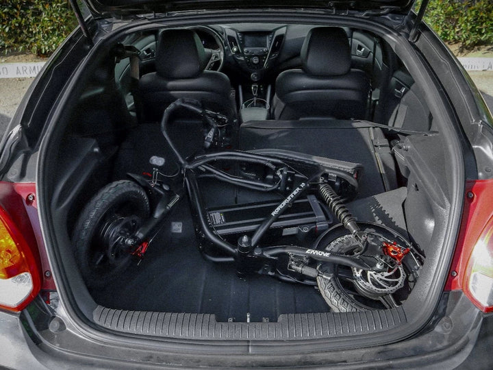 Roadrunner V3 packed into the boot of a sedan, showcasing its portability and easy transportation.