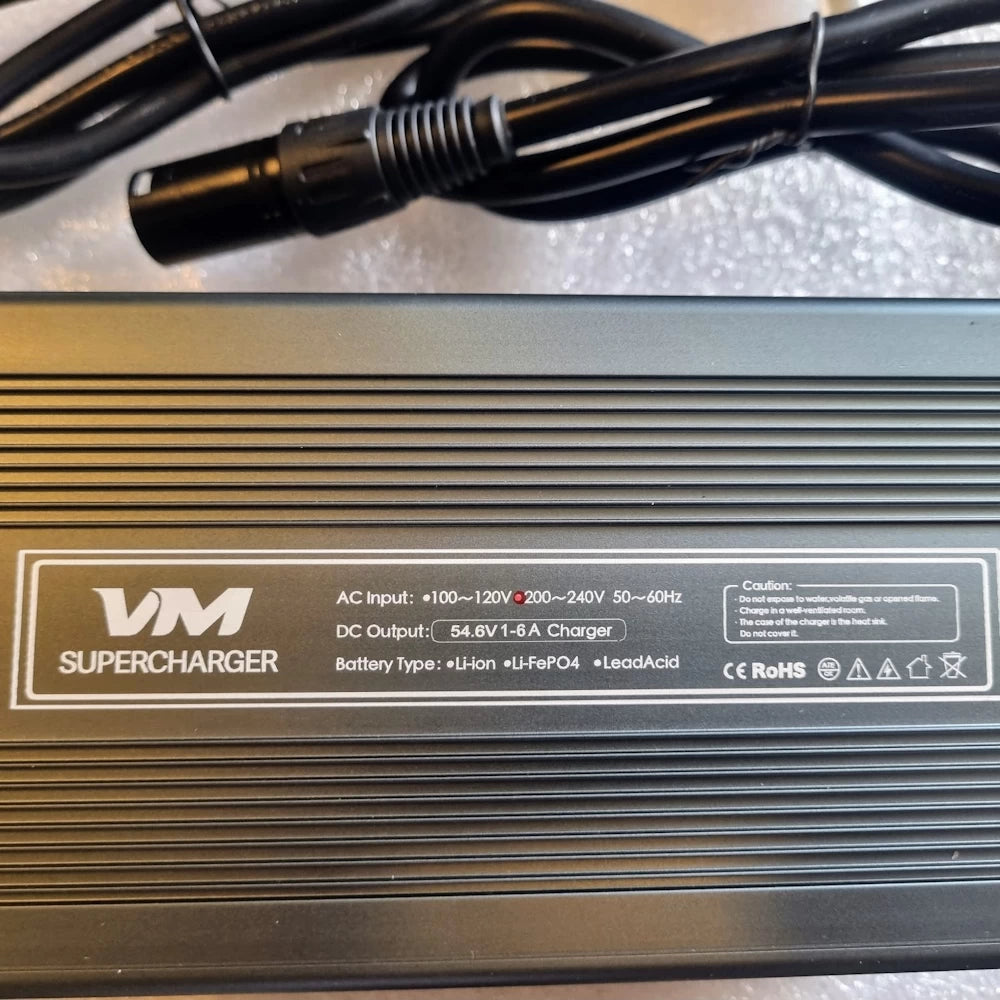 Label details of VM 48V Supercharger for EMOVE Roadrunner, featuring input and output specifications and RoHS certification.