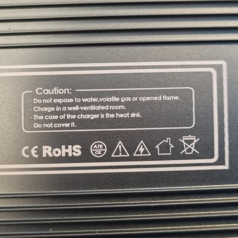 Caution label on EMOVE Roadrunner 48V Variable Supercharger, detailing safety precautions during use.