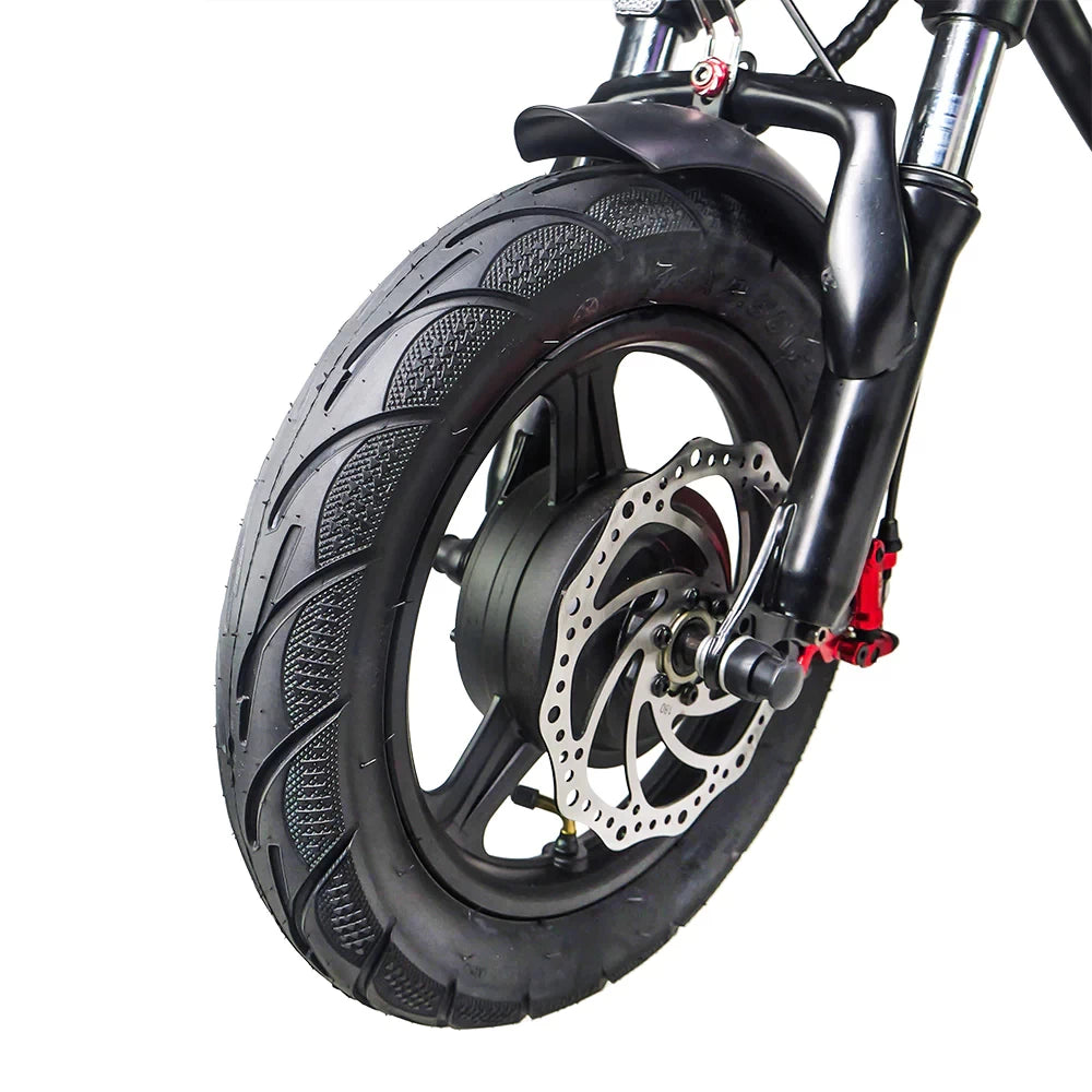 Front wheel of the EMOVE Roadrunner v2 electric scooter with disc brake - Close-up view of the powerful front disc brake and all-terrain tire, emphasizing stopping power and durability.