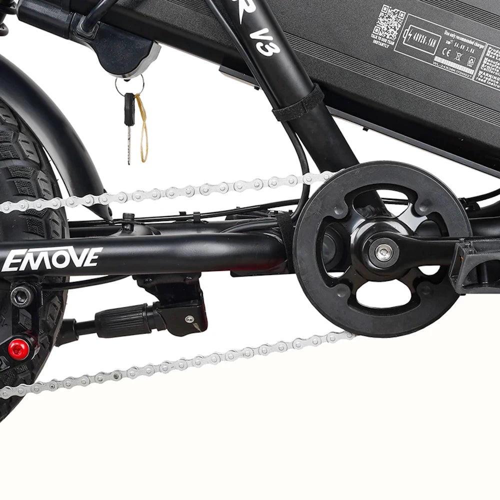 Close-up of the EMOVE Roadrunner V3 pedal system, highlighting the optional hybrid pedal kit for enhanced versatility and legal compliance.