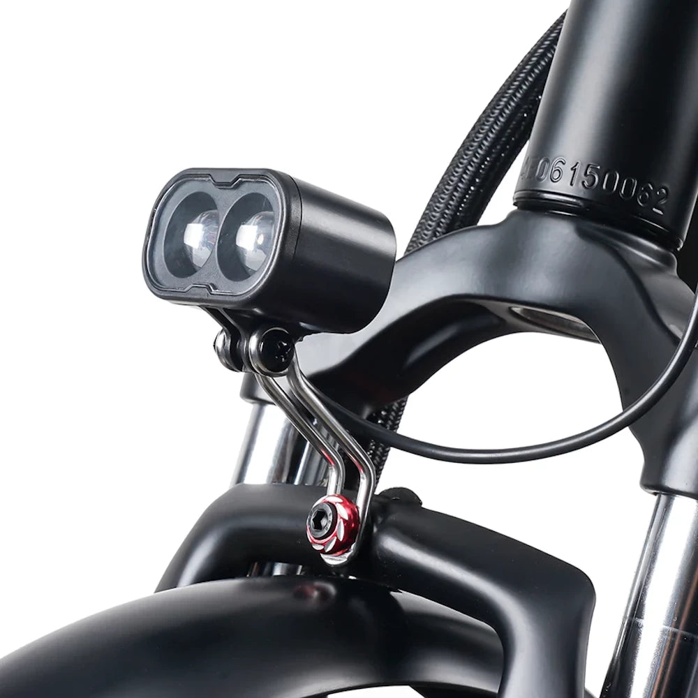 Close-up of the EMOVE Roadrunner V3 headlight with dual LED lights for enhanced nighttime visibility and safety.