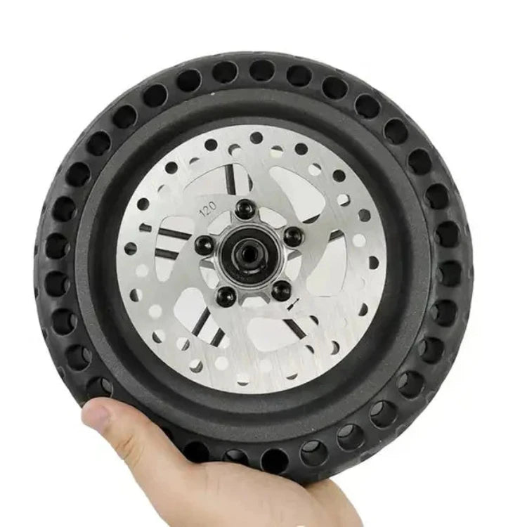 Perforated honeycomb tyre mounted on rear wheel with 120mm rotor for Xiaomi PRO/PRO2 scooters.