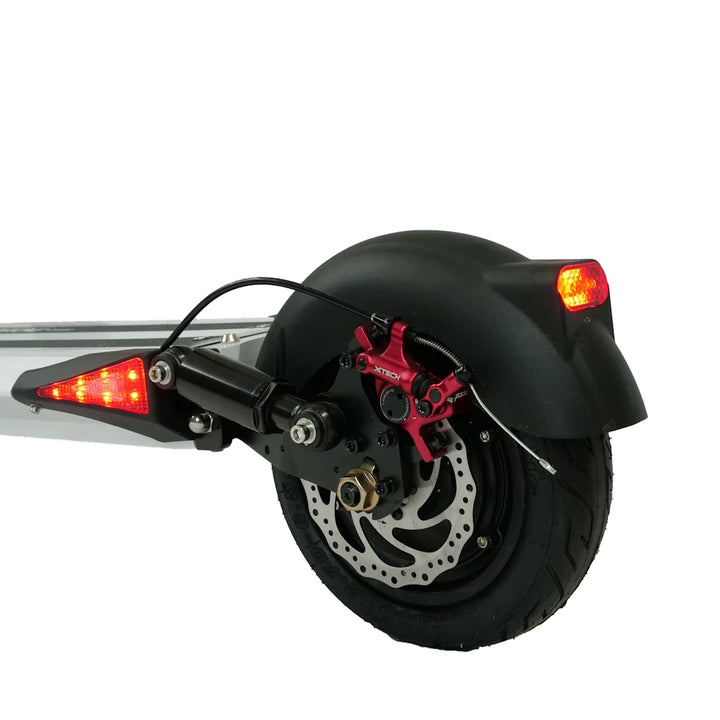 Rear fender fitted on EMOVE Cruiser electric scooter with red brake light and disc brake system.