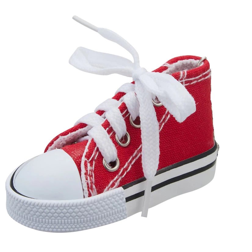 Red canvas kickstand shoe cover with white laces, side view