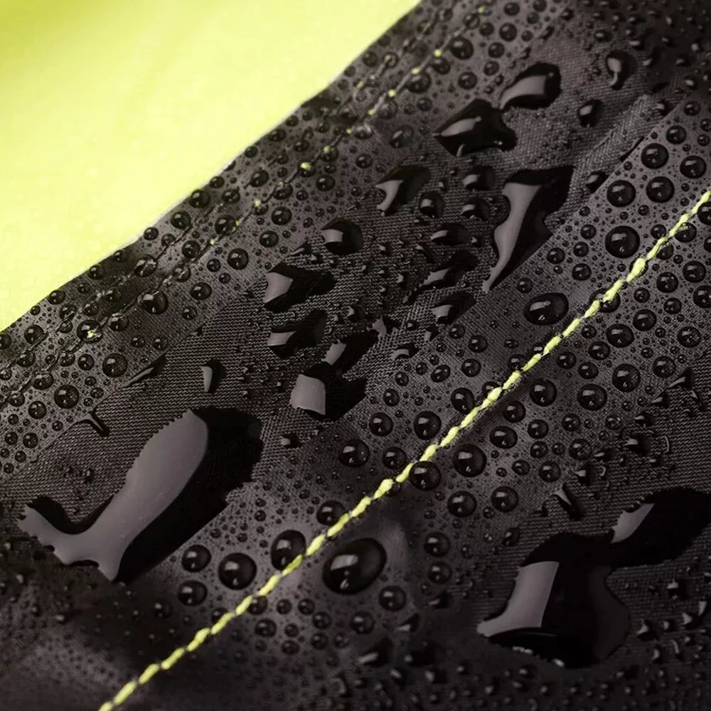 Close-up view of waterproof fabric with water droplets showing its rain-resistant material.