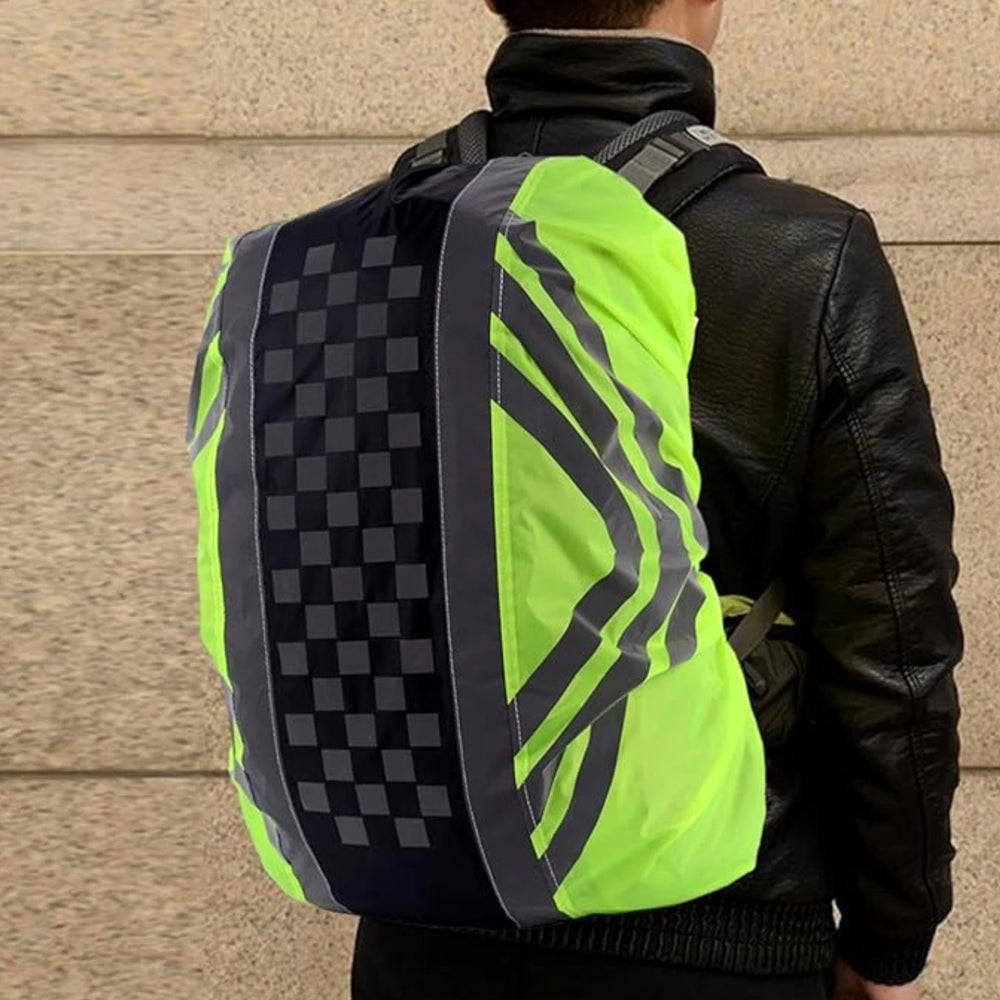 Person wearing backpack with reflective rain cover while cycling or commuting.