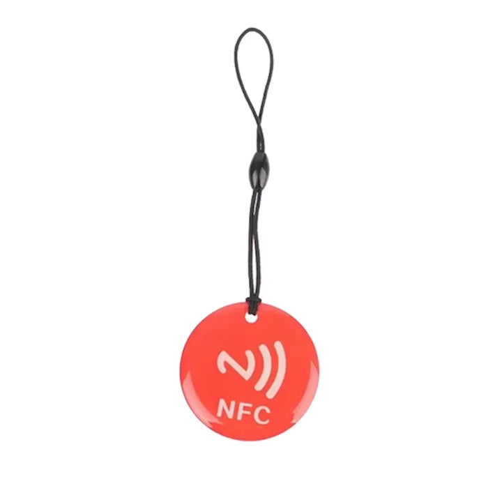 Red NFC tag token with rope, featuring NTAG213 chip and 144 bytes capacity, perfect for electric scooter NFC systems and other applications.