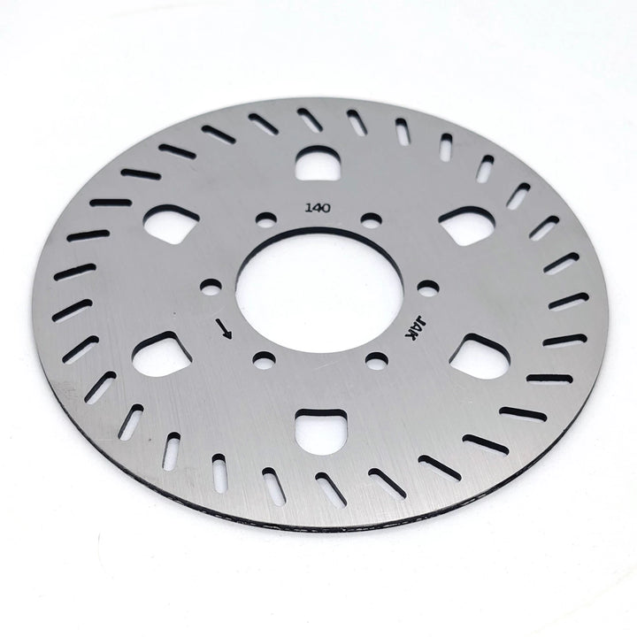 Angled view of the Genuine Segway GT1 GT2 140mm stainless steel OEM disc brake rotor showing directional arrow for correct fitment. 