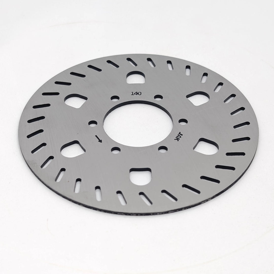 Low angle view of the Genuine Segway GT1 GT2 140mm stainless steel OEM disc brake rotor showing 6 bolt mounting holes and precision laser-cut cooling slots.