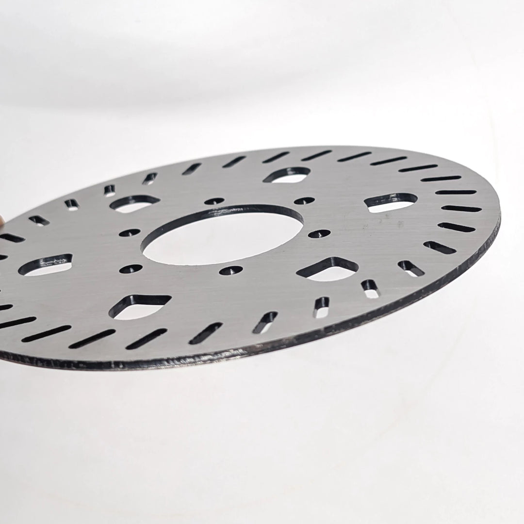 Side view of the Genuine Segway GT1 GT2 140mm stainless steel OEM disc brake rotor showing 2.5mm thickness 