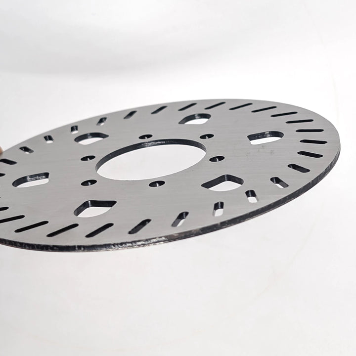 Side view of the Genuine Segway GT1 GT2 140mm stainless steel OEM disc brake rotor showing 2.5mm thickness 