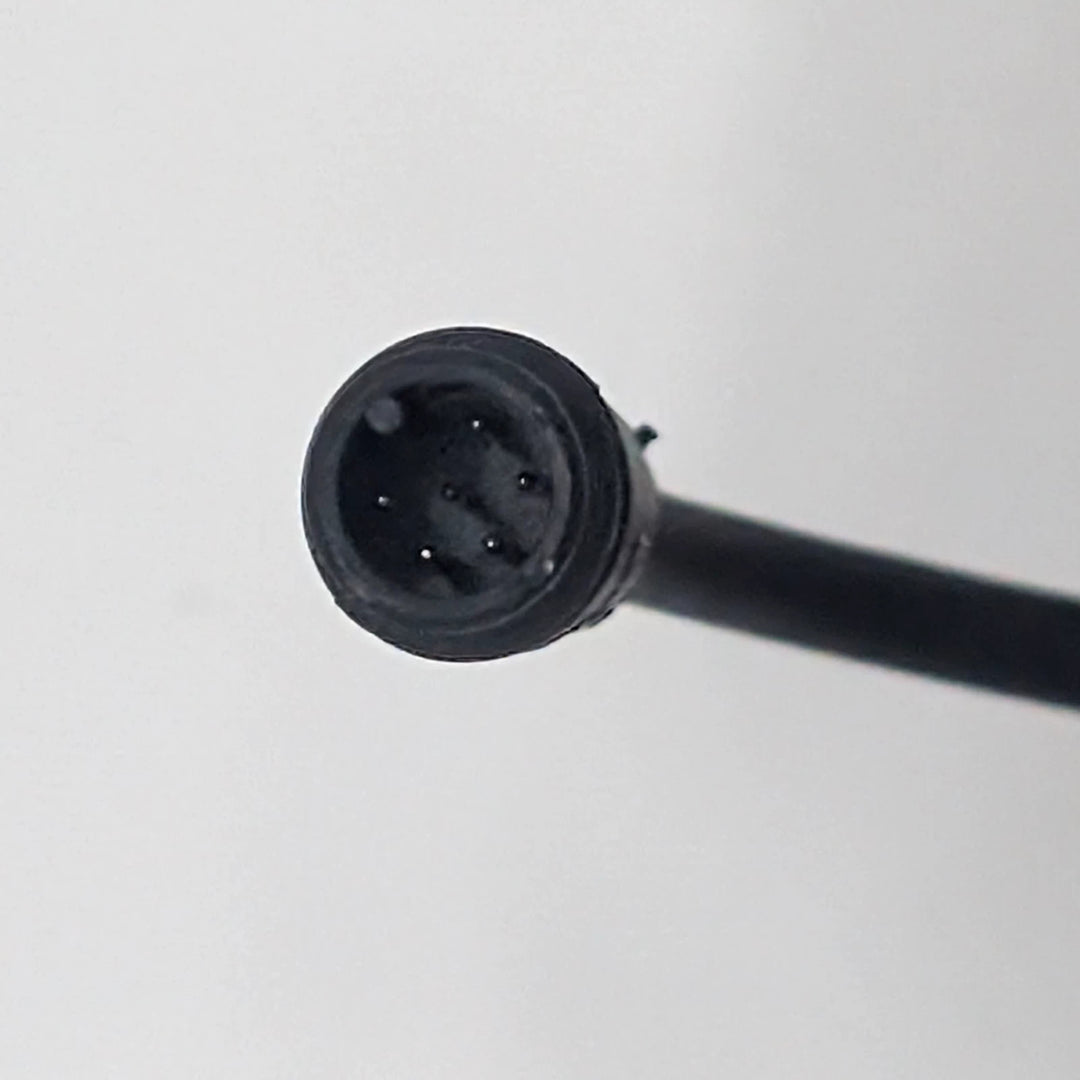 Close-up of 6-pin waterproof Julet male connector plug on Kaabo Wolf King GT TFT display