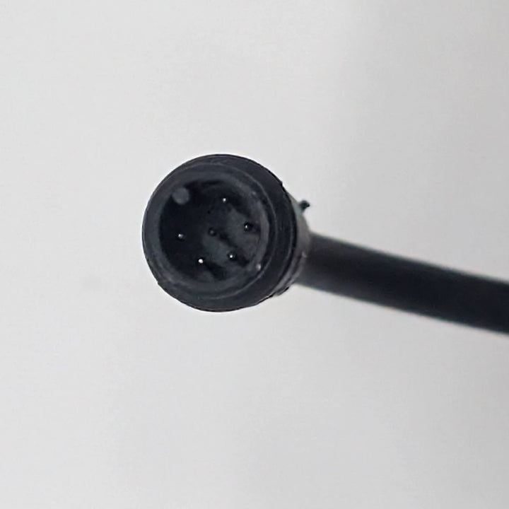 Close-up of 6-pin waterproof Julet male connector plug on Kaabo Wolf King GT TFT display