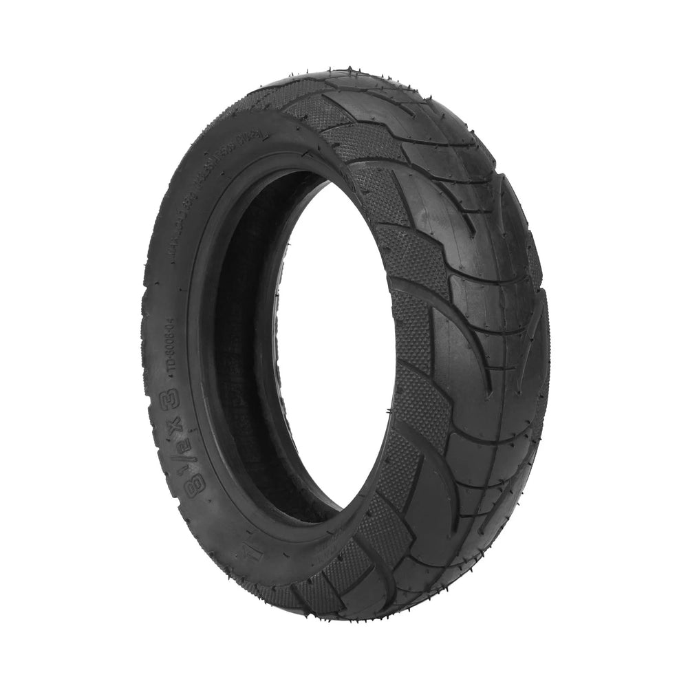 Side hero view of the TUOVT 8 1/2 x 3 outer tyre for Vsett 9, showing versatile urban and light off-road tread pattern.