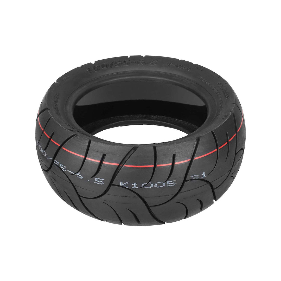 flat lay ULIP 100/55-6.5 self healing tubeless tyre for high performance electric scooters EcoMotion, showing self-repairing glue layer and directional tread pattern