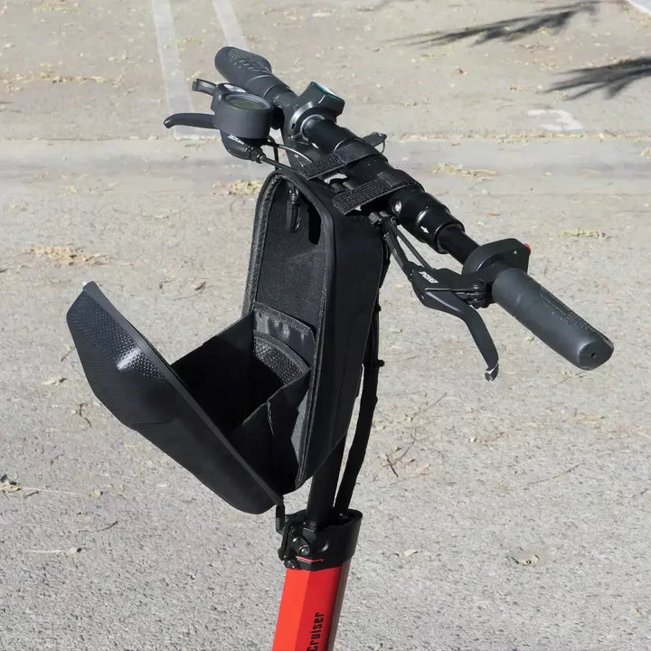 Open pouch attached to a VoroMotors scooter handlebar, revealing organized compartments, great for carrying valuables during rides.