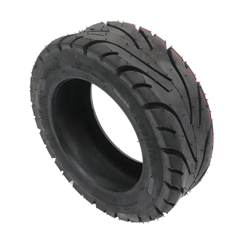 XuanCheng 90/65-6.5 tubeless scooter tyre angled left view