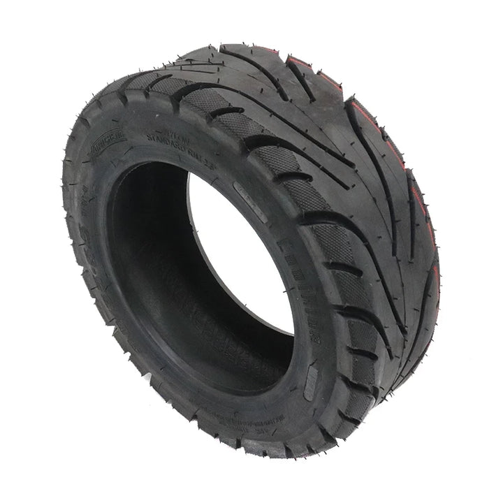 XuanCheng 90/65-6.5 tubeless scooter tyre angled left view
