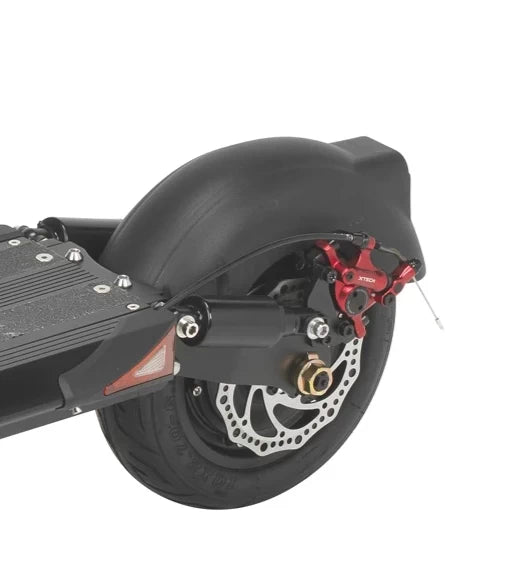 Xtech Zoom HB-100 red brake calliper installed on the rear wheel of a black EMOVE Cruiser electric scooter, offering improved braking efficiency.