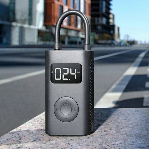 Xiaomi 1S Digital Air Pump with compact design and easy-to-use control buttons, ideal for inflating car, bike, and scooter tyres with precision and convenience.