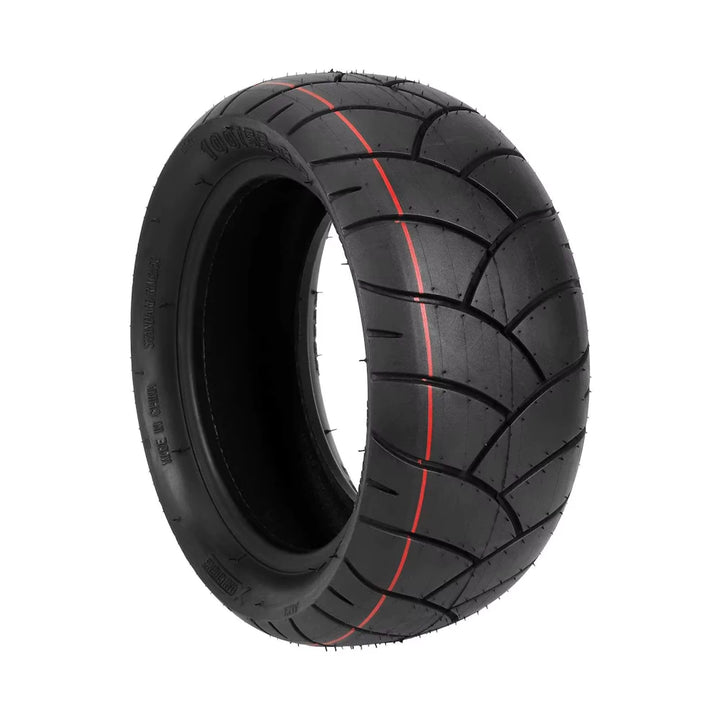 Hero view of Xuancheng 100/55-6.5 tubeless electric scooter tyre with directional road tread and red line.
