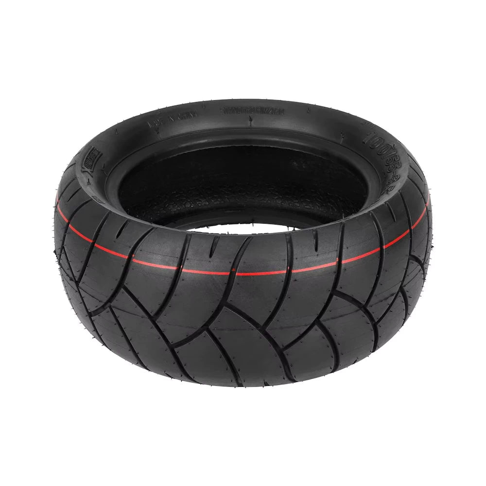 Side view of 100/55-6.5 Xuancheng tyre showing curved road tread and red guiding stripe for high grip on urban surfaces.