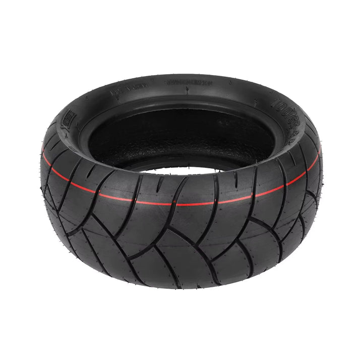 Side view of 100/55-6.5 Xuancheng tyre showing curved road tread and red guiding stripe for high grip on urban surfaces.